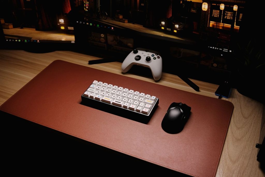 A mechanical keyboard and controller viewed from above